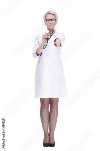 attentive female doctor holds her stethoscope. isolated on a white background.