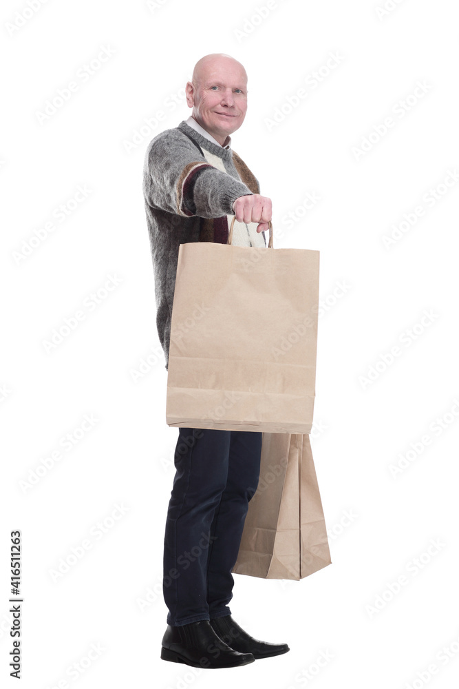 casual man showing shopping bags with shopping.