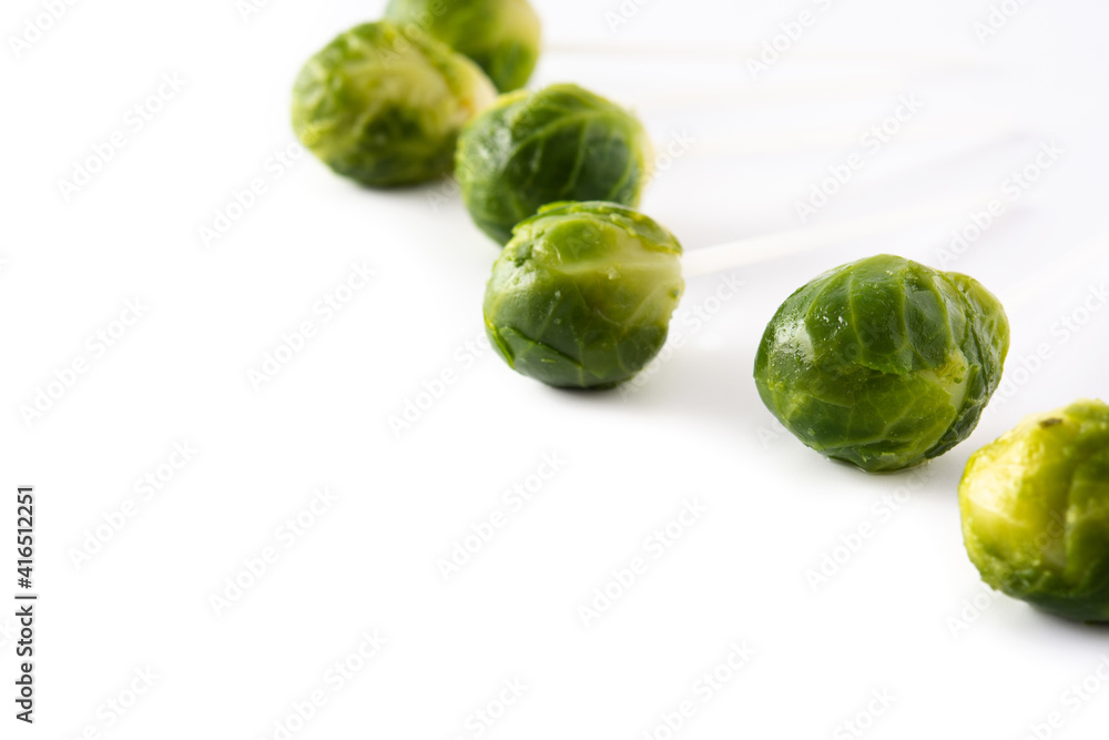 Set of brussel sprouts with lollipop sticks isolated on white background Set of brussel sprouts with lollipop sticks isolated on white background
