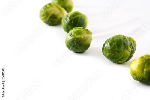 Set of brussel sprouts with lollipop sticks isolated on white background © chandlervid85