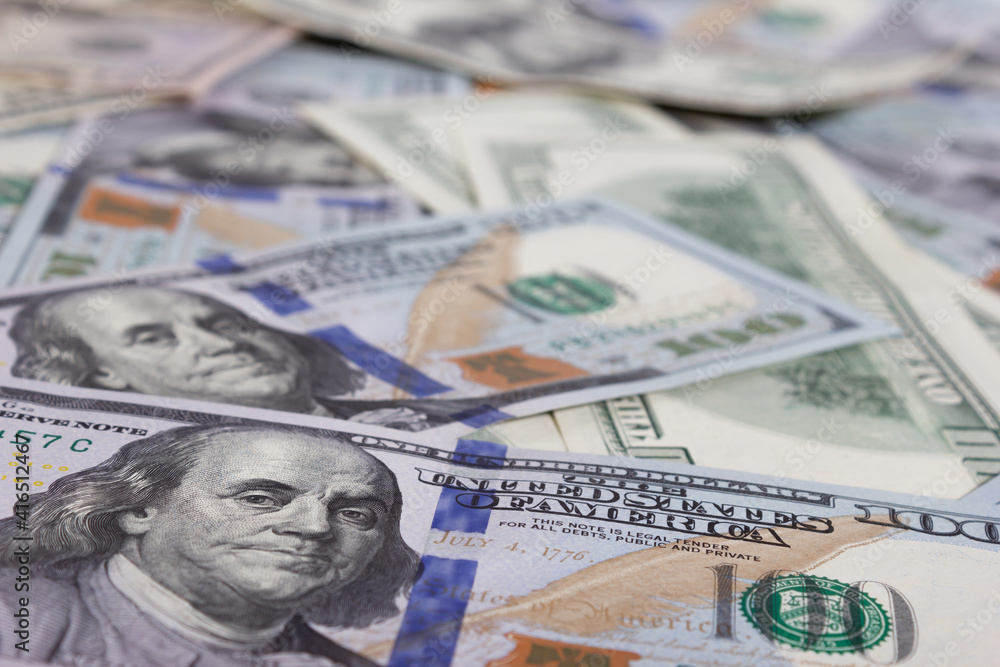 Bundle of dollars on the table close-up - texture, background Bundle of dollars on the table close-up - texture, background