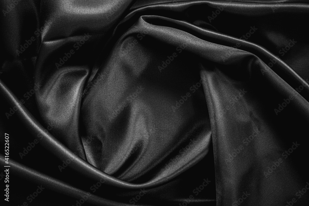 Wrinkle black satin cloth texture background