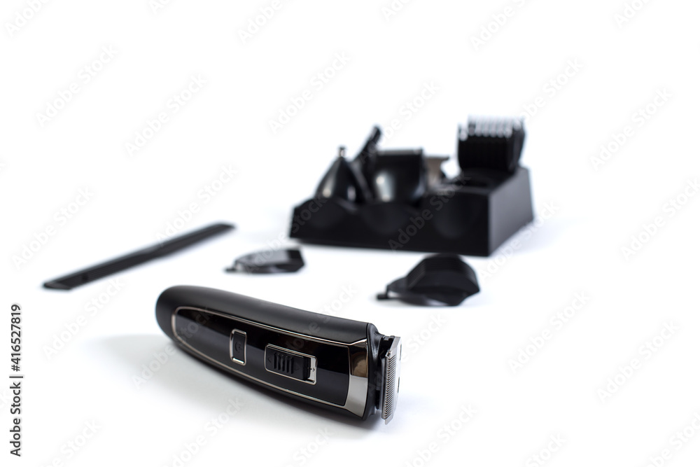 Wireless electric trimmer set. Kit tools for barber isolated on white. Wireless electric trimmer set. Kit tools for barber isolated on white.