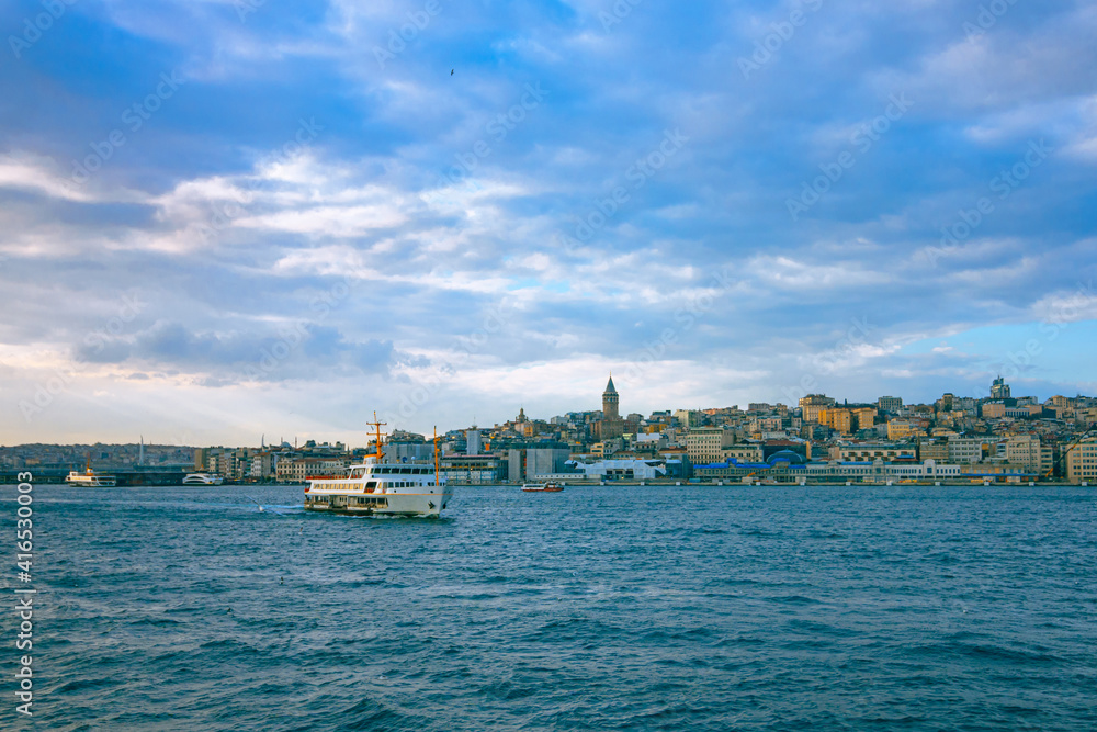 cityscape of Istanbul and a ferry