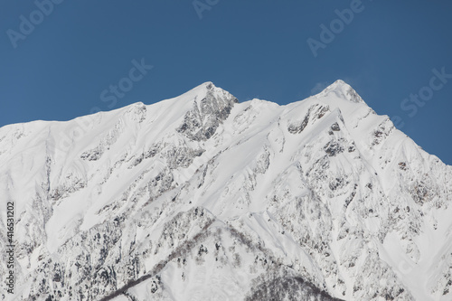 Wallpaper Mural 強風で雪け煙る 鹿島槍ヶ岳山頂 Torontodigital.ca