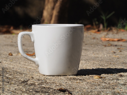 coffee mug on the cement floor