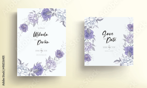 Beautiful wedding invitation card with purple flower decoration