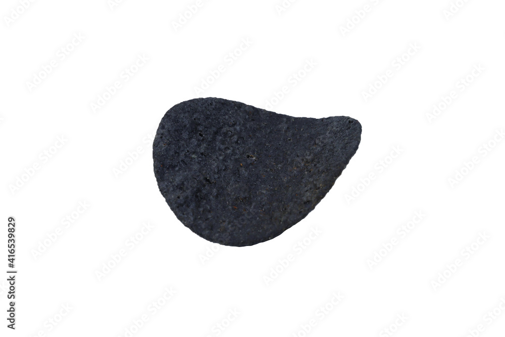 Black potato chips on an isolated white background. Black food Black potato chips on an isolated white background. Black food
