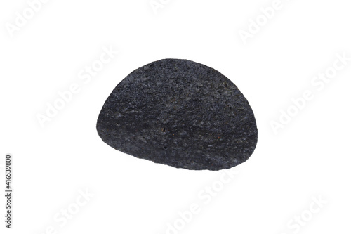 Black potato chips on an isolated white background. Black food