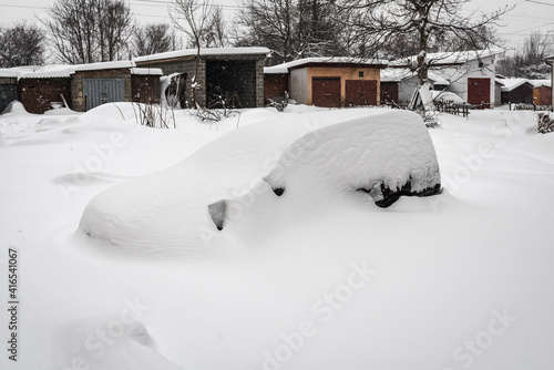the car covered with snow © Volodymyr Shevchuk