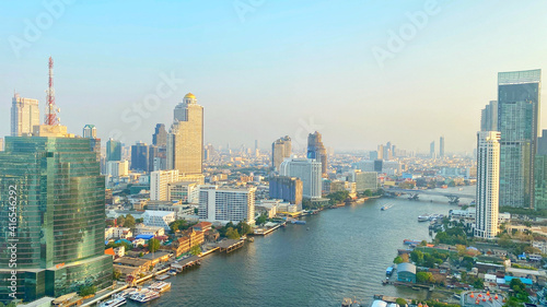 beautiful panoramic view of Bangkok cityscape and Chao Phraya river which is the major river of Bangkok, Thailand