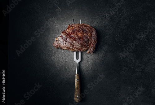 Fotomurale grilled beef steak on a dark background
