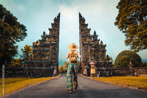 Woman with backpack exploring Bali, Indonesia.  photo