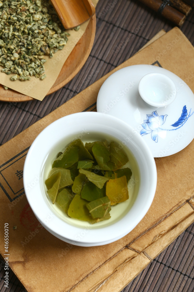 Lotus leaf tea in blue and white porcelain covered bowl Lotus leaf tea in blue and white porcelain covered bowl