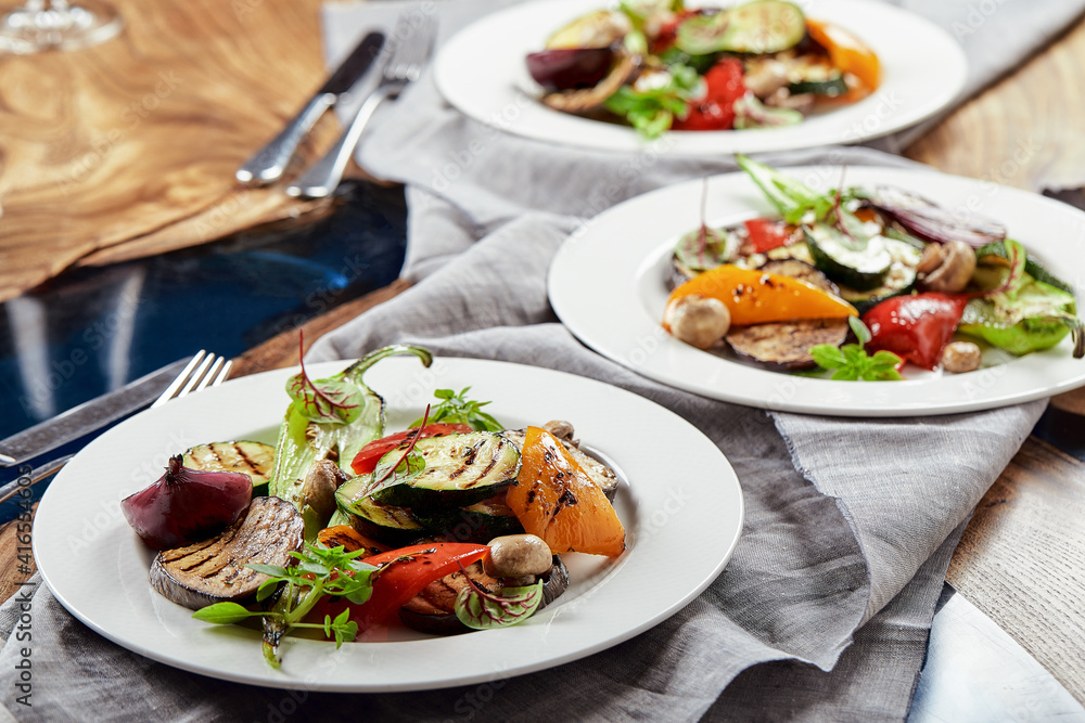 Grilled vegetables on a white plates. restaurant Grilled vegetables on a white plates. restaurant