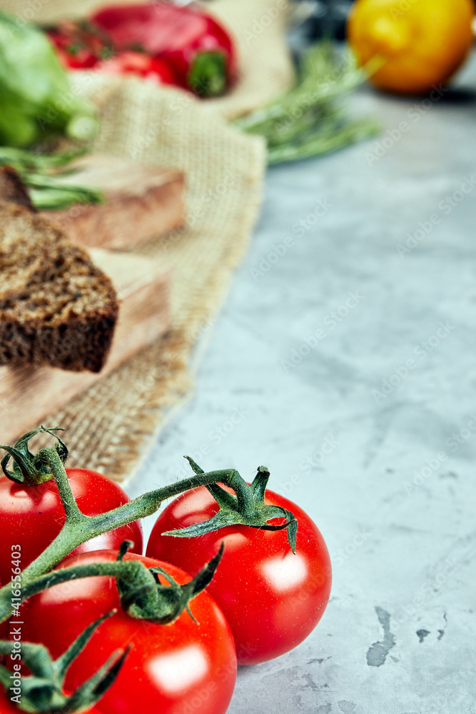 tomatoes on gray concrete texture background tomatoes on gray concrete texture background