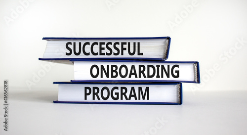 Successful onboarding program symbol. Books with words 'Successful onboarding program' on beautiful white background. Business and Successful onboarding program concept. Copy space.