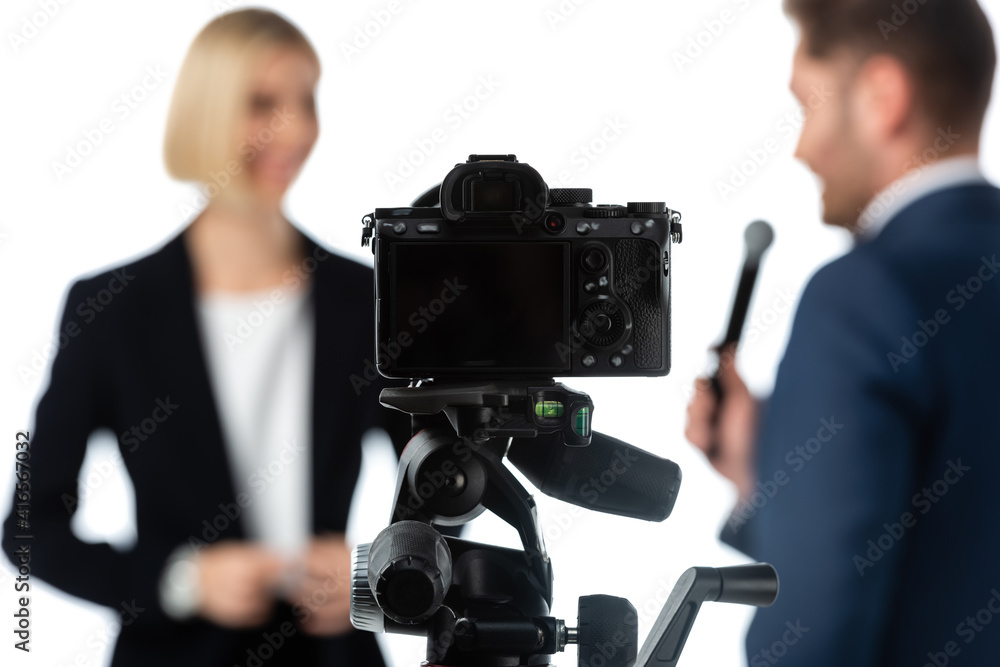 selective focus of digital camera near journalist taking interview from businesswoman isolated on white selective focus of digital camera near journalist taking interview from businesswoman isolated on white