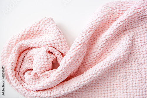 soft voluminous luxury pink towel on a white background