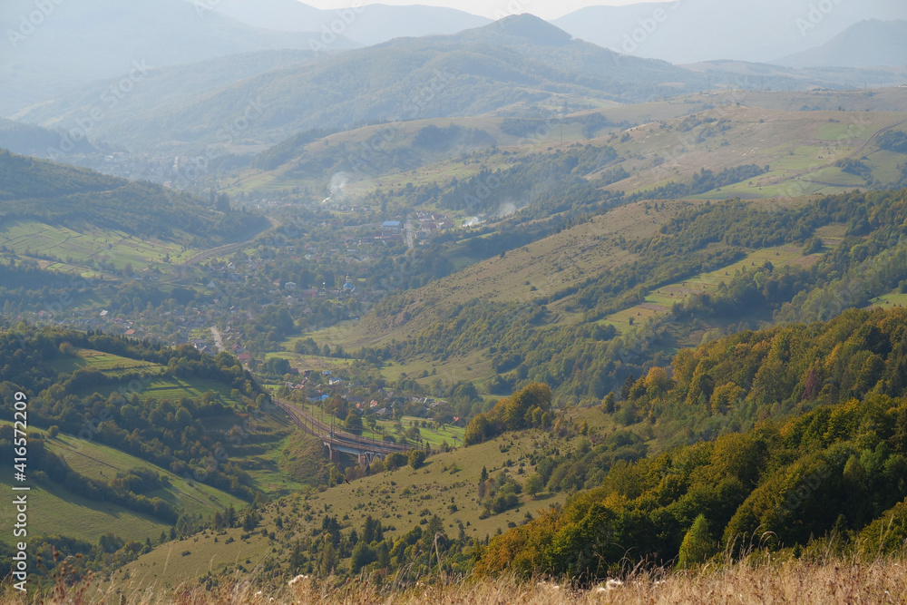 Panorama view of beautiful Carpathian mountains and village Panorama view of beautiful Carpathian mountains and village