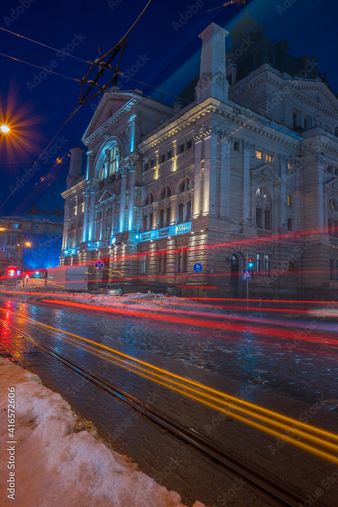 Fototapeta premium Night Lviv old city architecture in the winter season. Buildings highlighted by the illumination