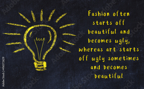 Chalk drawing of a bulb and inscription of wise quote