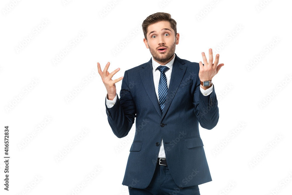 shocked businessman gesturing while looking at camera isolated on white shocked businessman gesturing while looking at camera isolated on white