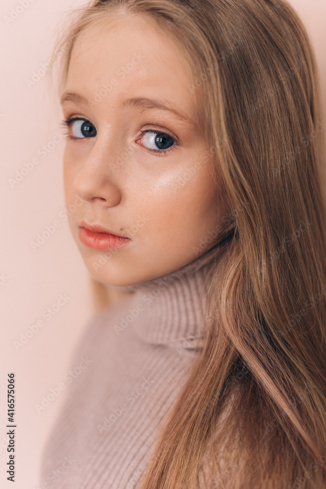 Fashion stylish caucasian girl portrait in studio with flowers Fashion stylish caucasian girl portrait in studio with flowers