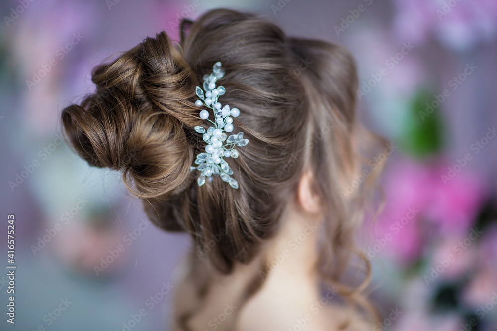 Naklejka premium elegant wedding hairstyle with decoration