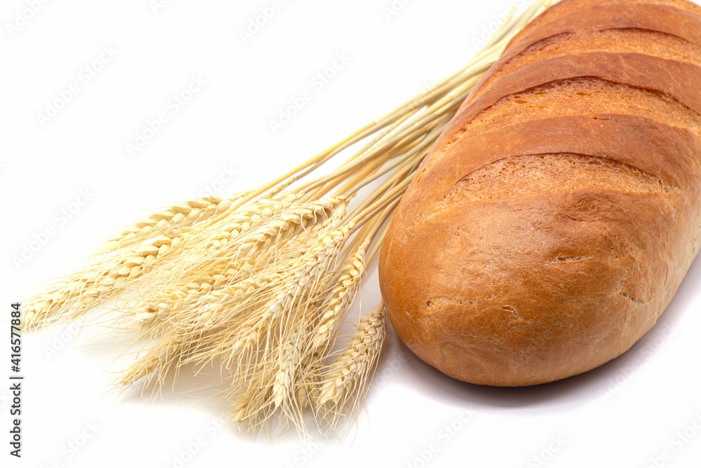 Composition of white bread, wheat on white background