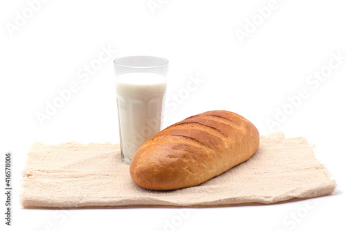 Obraz na płótnie Composition of glass of milk, white bread, tablecloth on white background w salonie