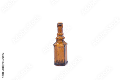 Obraz na płótnie Small empty brown glass bottle on white background w salonie