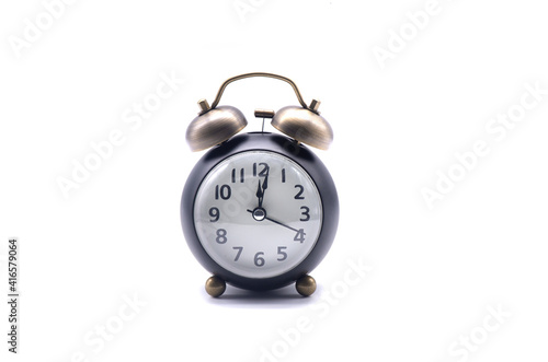Retro alarm clock on white background