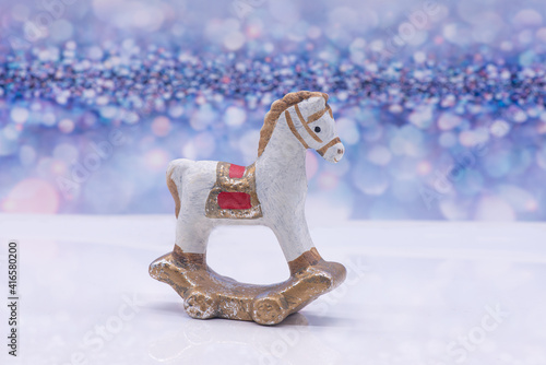 Obraz na płótnie Toy clay horse on a festive background w salonie
