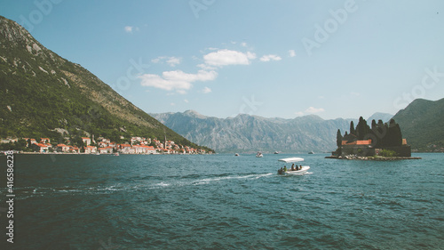 Boat travels to Our Lady of the Rock, The Bay of Kotor, Montenegro © Joe