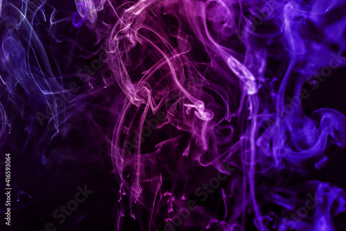 Abstract multi coloured smoke as background. 