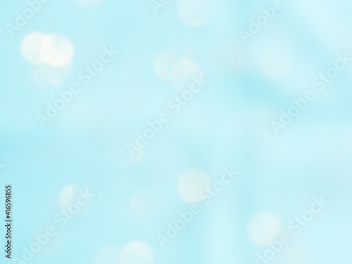 Abstract light blue blur bokeh design background.