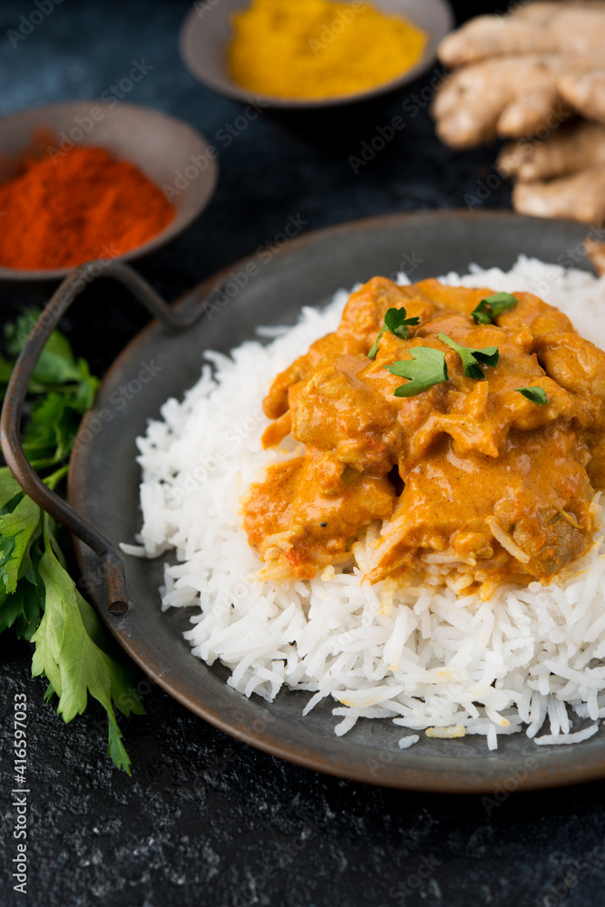 Chicken curry with rice and spices - a traditional popular Indian dish