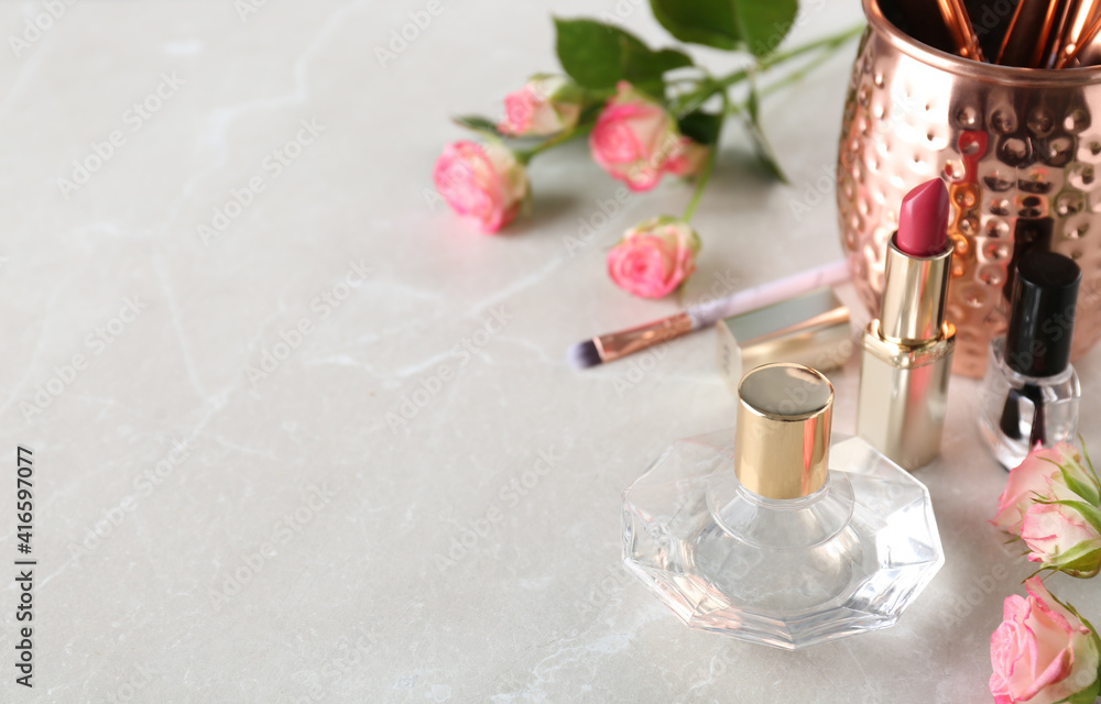 Beautiful composition with lipstick, perfume and nail polish on light  table, space for text foto de Stock | Adobe Stock
