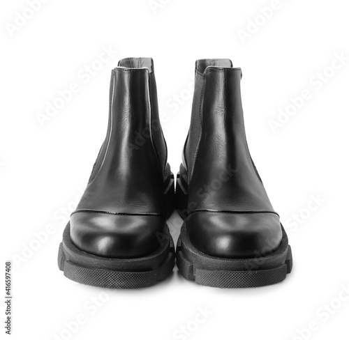 Pair of stylish boots on white background