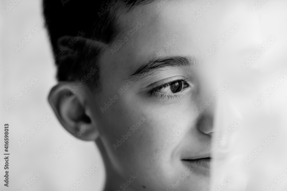 Black and white portrait of child.