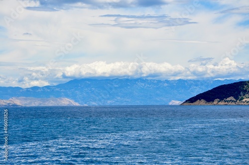 Velebit mountain covered with clouds, view from Adriatic Sea