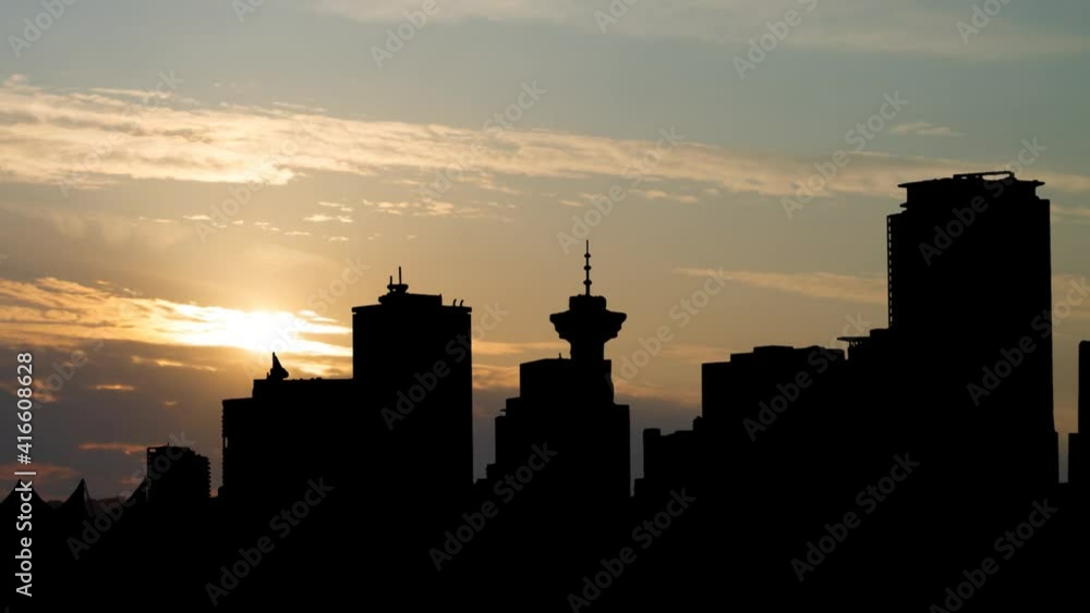 Vancouver skyline: Time Lapse at Sunrise with Colorful Clouds. British Columbia, Canada Vancouver skyline: Time Lapse at Sunrise with Colorful Clouds. British Columbia, Canada