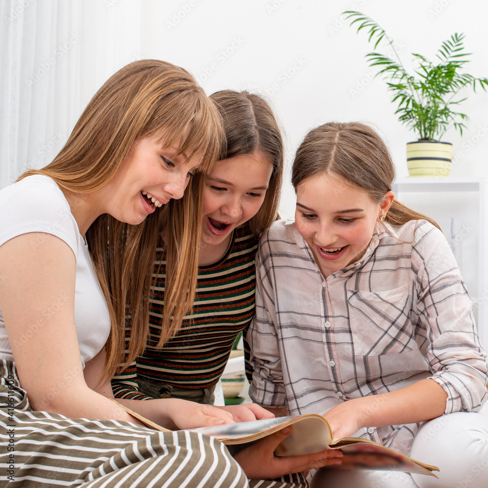 Teen girls spend time together at home Teen girls spend time together at home