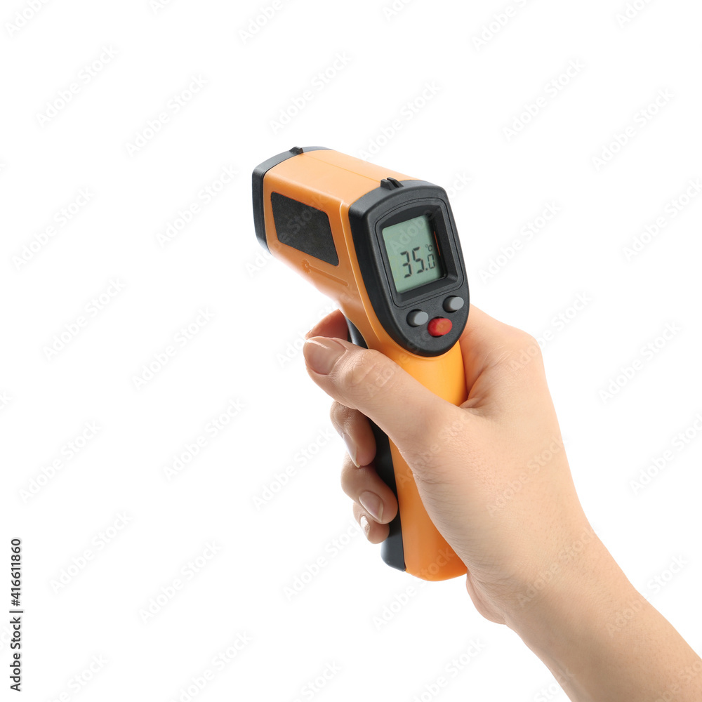 Woman with infrared thermometer on white background, closeup. Checking temperature during Covid-19 pandemic Woman with infrared thermometer on white background, closeup. Checking temperature during Covid-19 pandemic