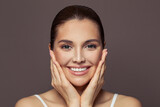 Young beauty female face closeup portrait. Healthy model woman smiling