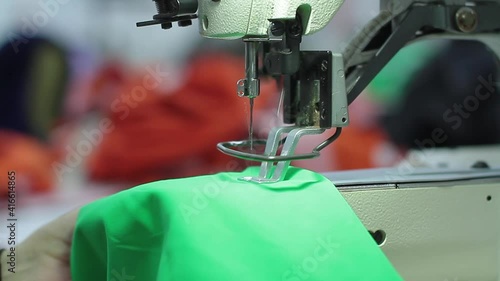 Sewing production. Machine for stitching on fabric.