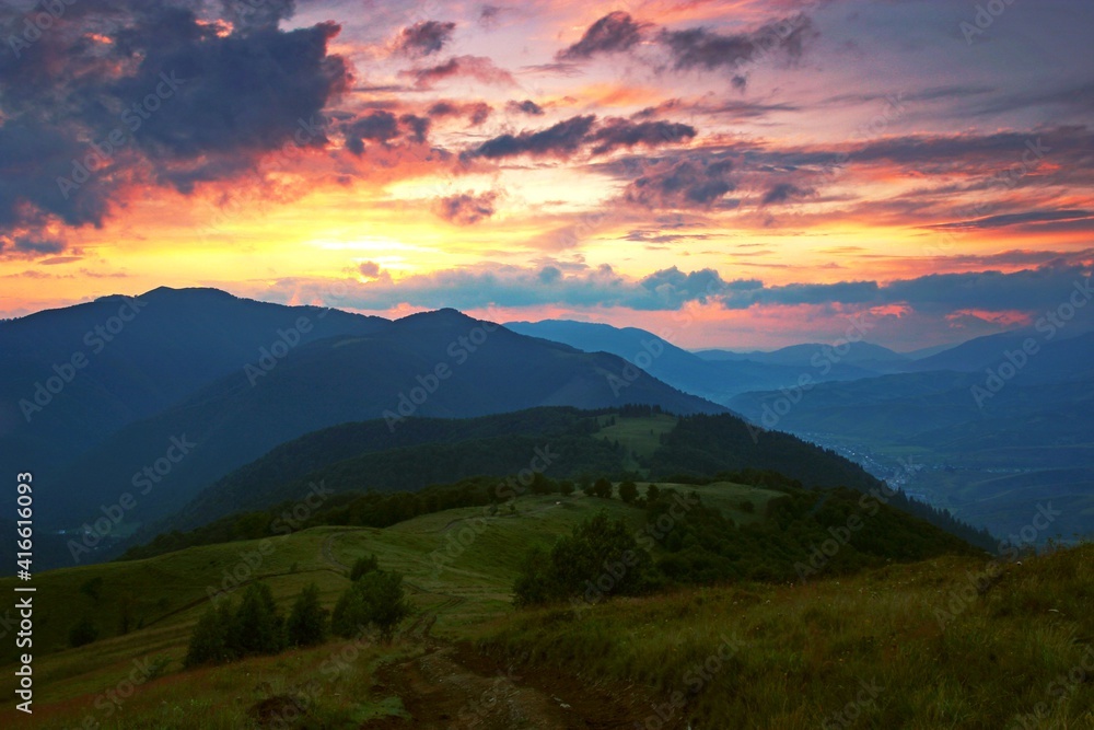 wonderful panoramic summer sunset image, natural sundown scenery, majestic evening landscape, beautiful nature background in the mountains, Carpathians, Ukraine, Europe	