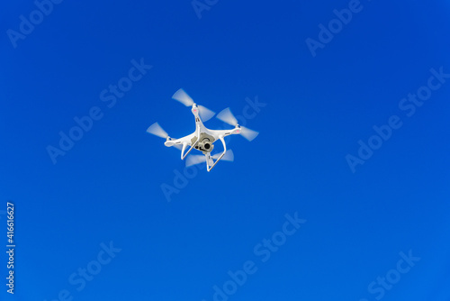 drone flight in the blue sky © Leszek