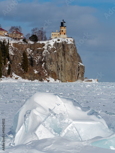 Lighthouse and ice on the lake